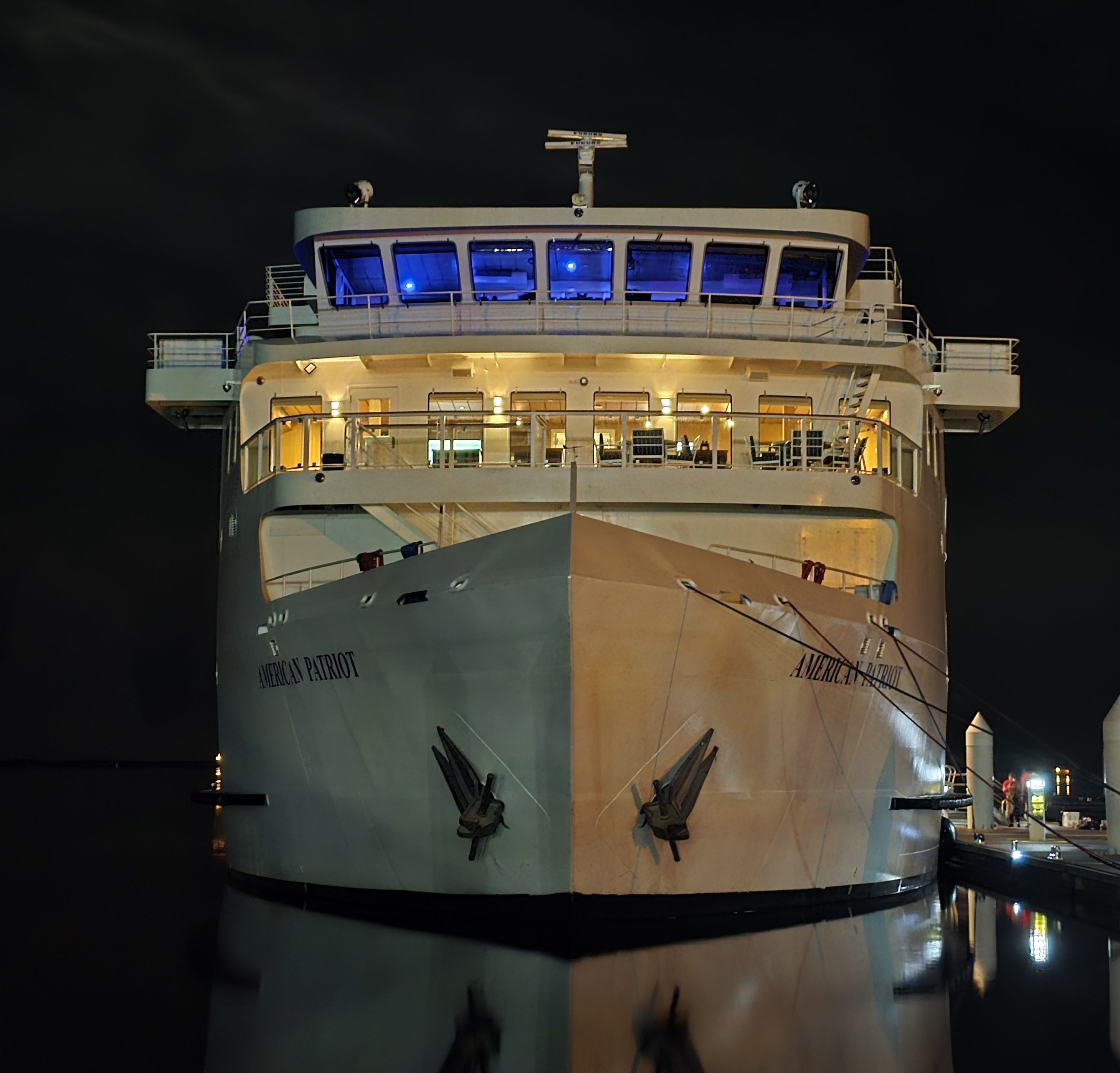 Small Cruise ship at night - overseeing maritime operations